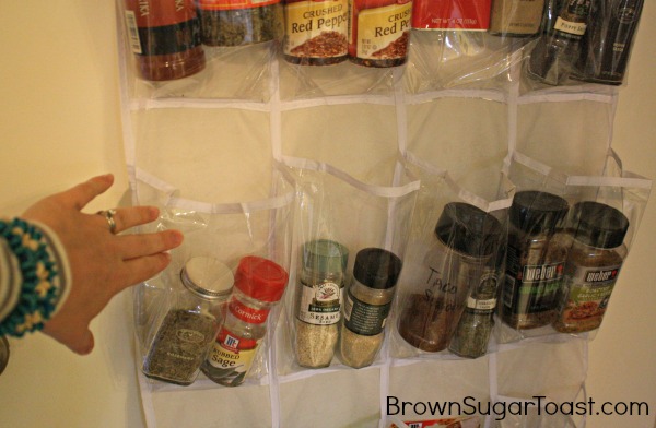 LOVE this idea! Organizing your spices using an over the door shoe holder! Perfect for different bottle/jar sizes!